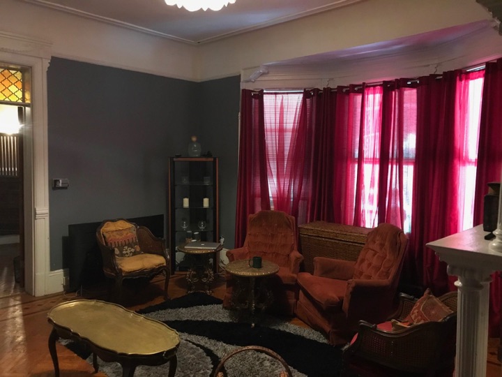 Living room red drapes