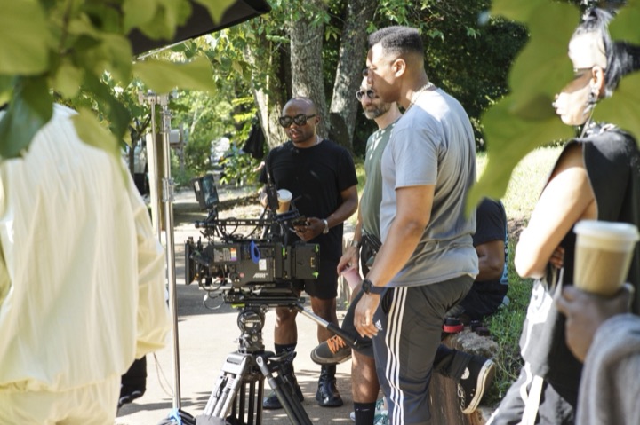 Behind the scenes: car shoot crew tripod